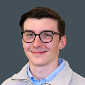 Joseph Spencer - Headshot Square - Dark Grey